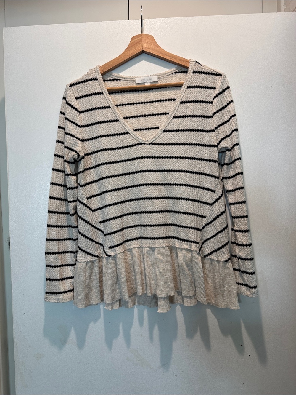 Anthropologie Cream and Black Striped V-Neck Peplum Sweater